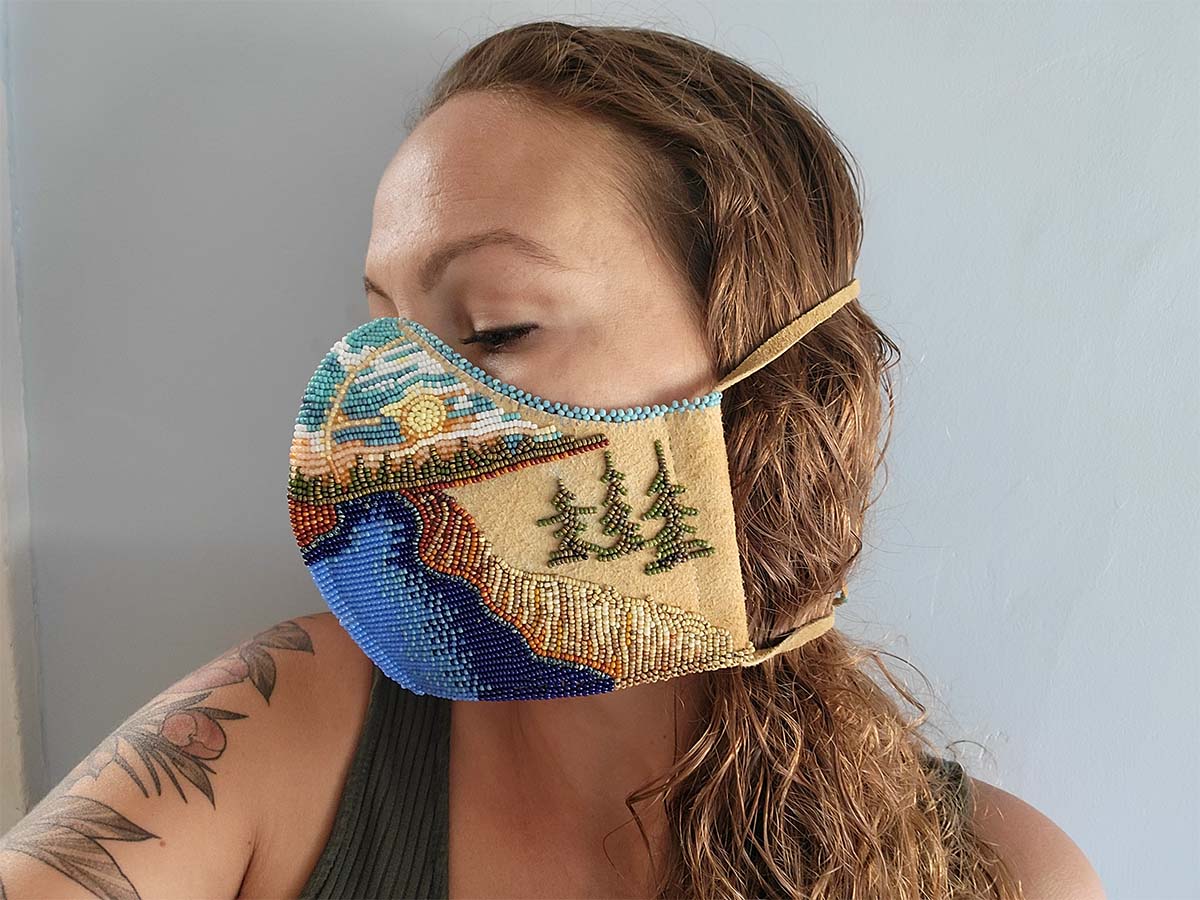 Vanessa Hyggen taking a selfie wearing the completed face mask